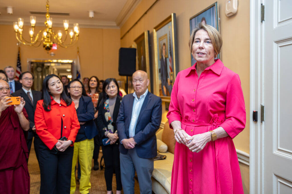 Maura Healey opens her arms wide while saying, ""This is a place for advocacy and policy change and reforms, and the like… I look forward to more recommendations and things that come out of that important, important work."