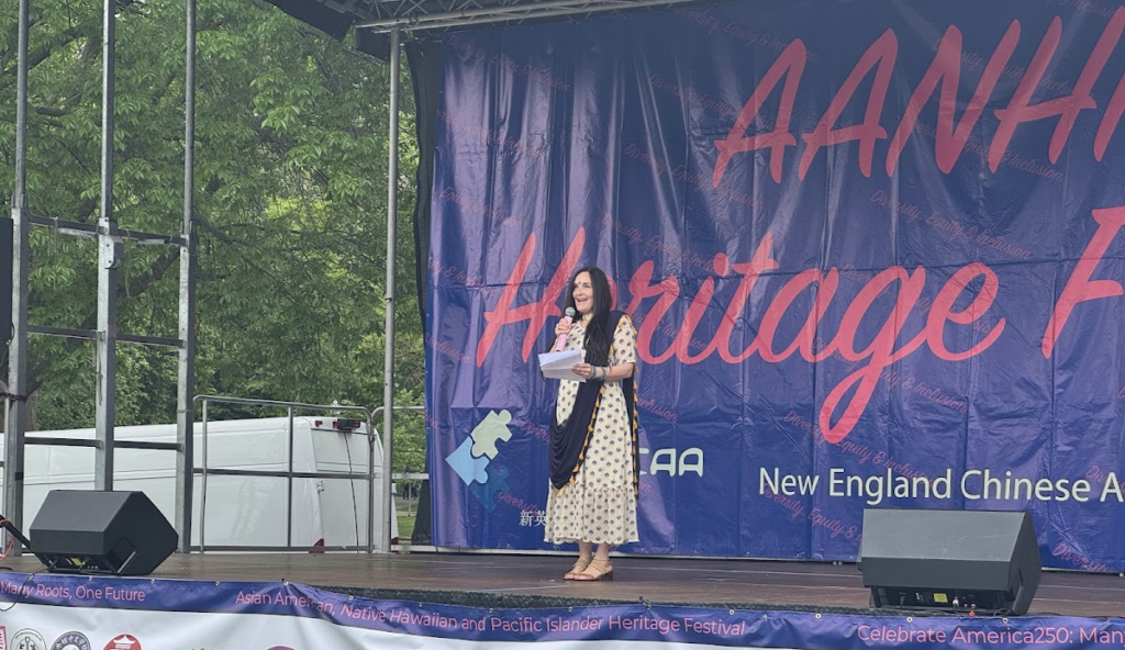 AAPIC Vice Chair Rakashi Chand Speaks in front of the crowd at AANHPI Celebration in Boston Common