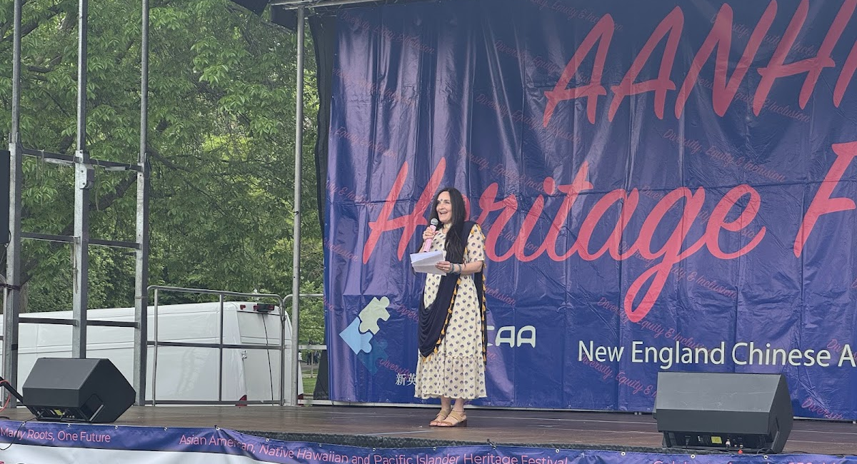 AAPIC Vice Chair Rakashi Chand Speaks in front of the crowd at AANHPI Celebration in Boston Common