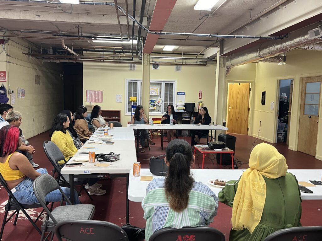 Community members at Unerased Documentary Lowell Screening Having Conversations
